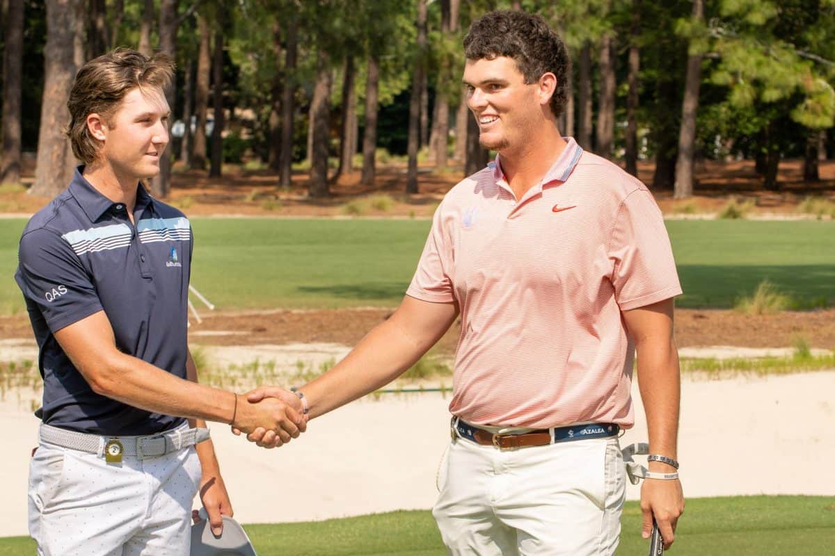 Louis Dobbelaar, left, shakes hands with Zack Gordon after Dobbelaarโs semifinal win in the 121st North & South Amateur. (Photo by John Patota)