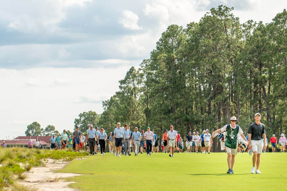 A sizable gallery follows Pinehurstโs Jackson Van Paris during the North & South semifinals. (Photo by John Patota)