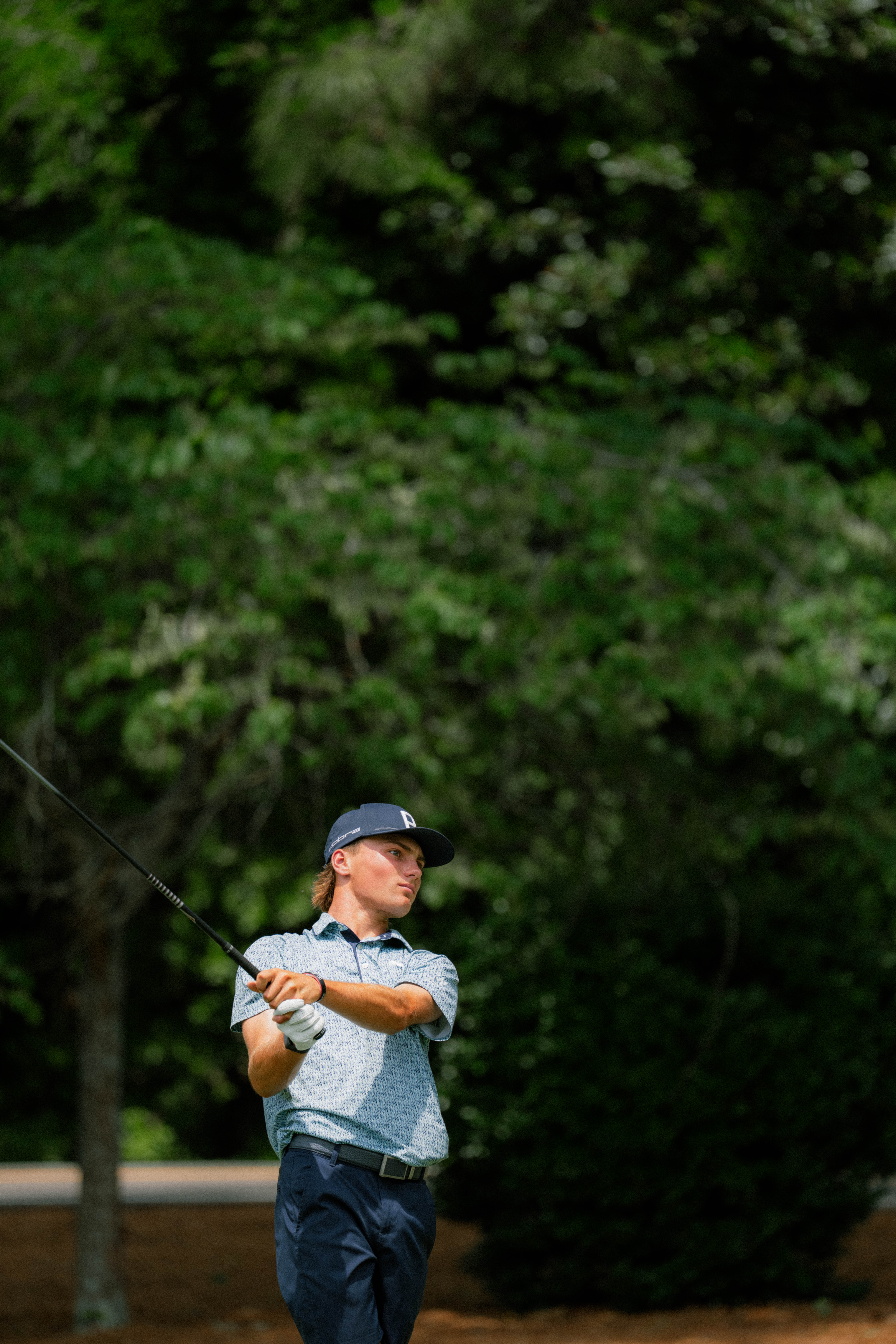 Tyler Watts hits a tee shot on Tuesday.