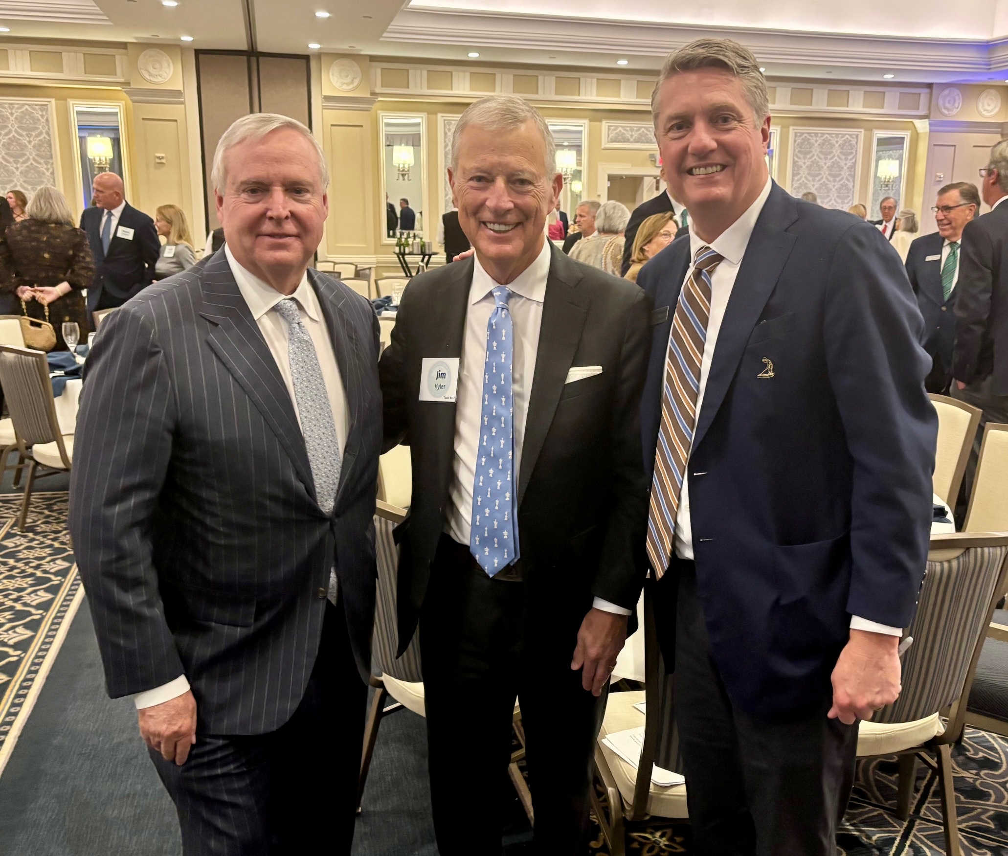 Pinehurst Resort CEO Bob Dedman Jr. (left) is joined by past USGA President Jim Hyler and Pinehurst Resort President Tom Pashley at the Carolinas Golf Hall of Fame ceremony.